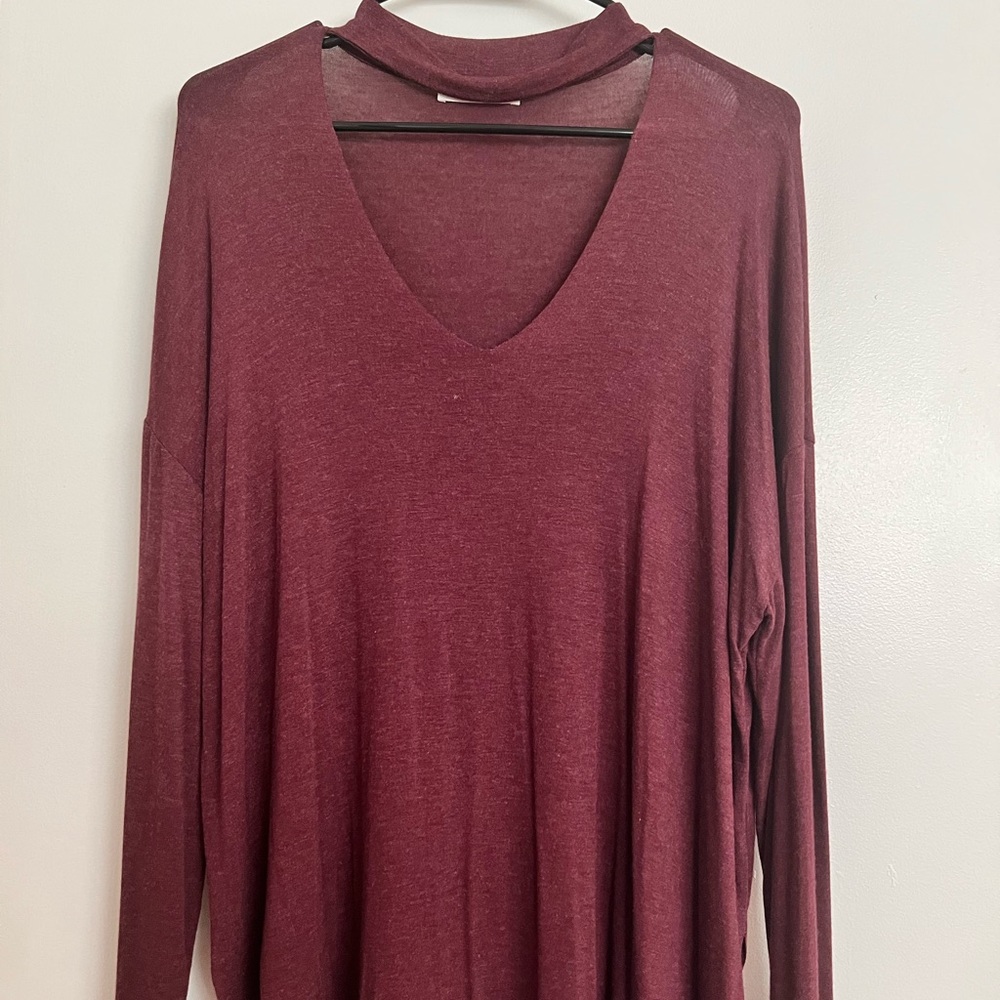 Maroon colored V-neck collar shirt